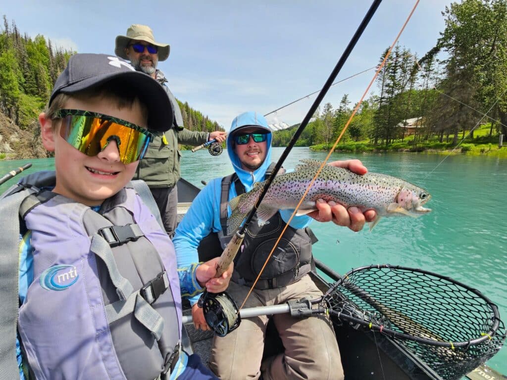 Clients with a nice catch on a Kenai River Trout Trips