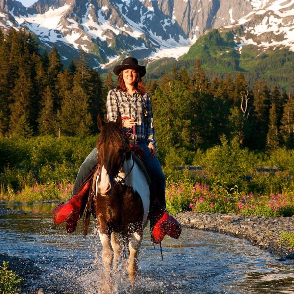 Breanna Bardarson horseback riding near Resurrection Bay, Seward, Alaska.