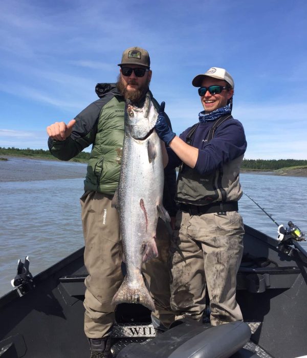 Drifters Guide holding a king salmon on the Kasilof River